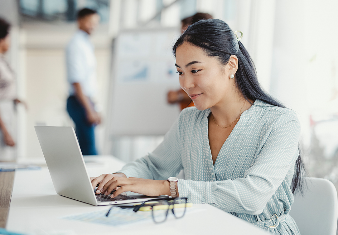Woman at computer accessing nonprofit data