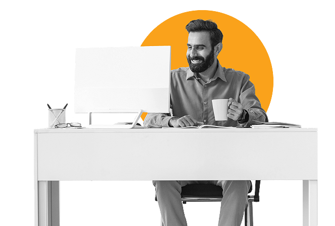 Man at computer accessing nonprofit data.