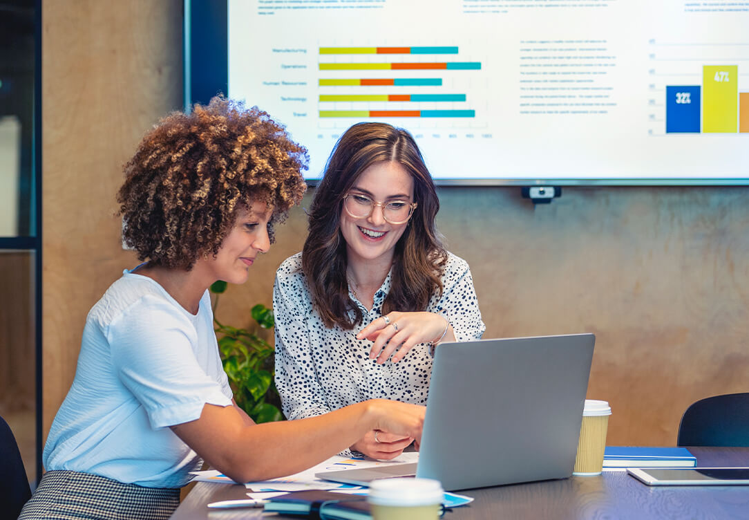 Women reviewing nonprofit financials.
